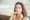 Patient Holding Her Invisalign clear aligners