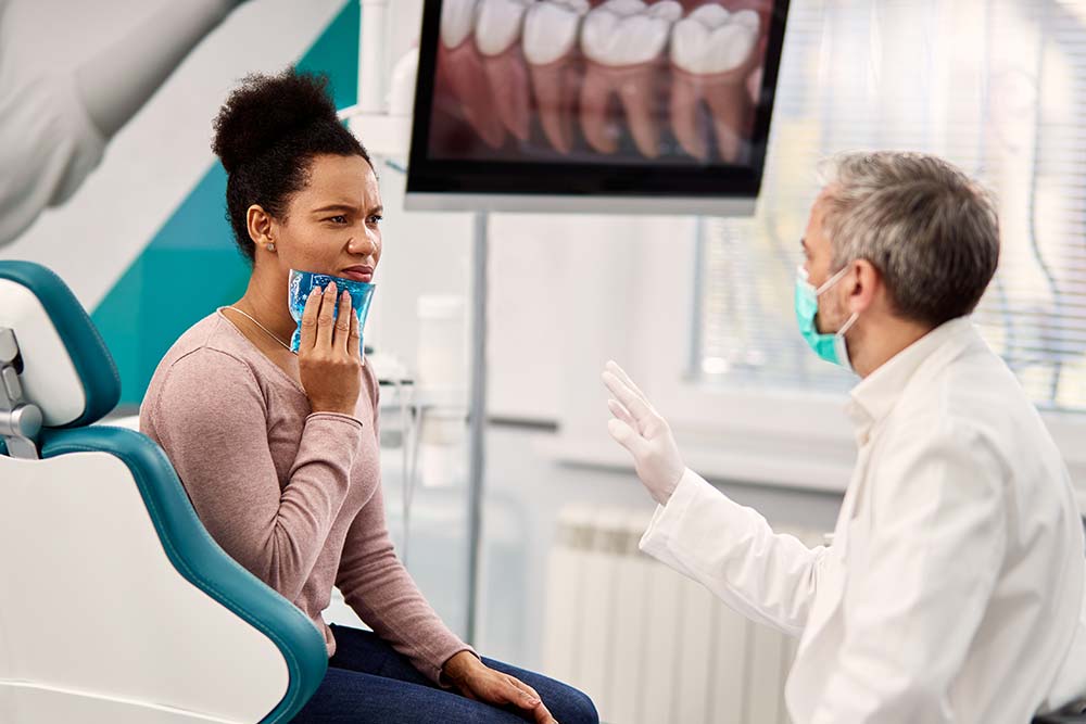 A Patient Listening to her Dentist