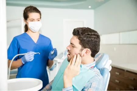 Patient Having his Dental Operation with his Dentist